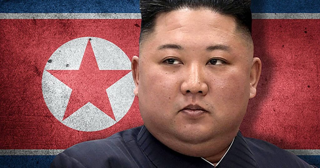 Kim jong un and the north korea flag1